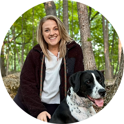 Life Coach Toni Phillips With Dog In Forest Circle